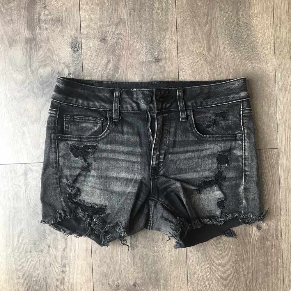 Faded black raw hem jean shorts